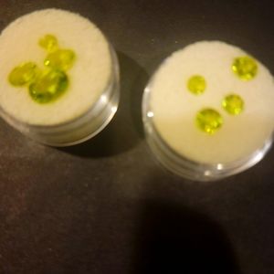 Mixed loose peridot gemstones